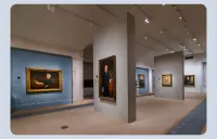 Photo of a museum with presidential portraits on the wall