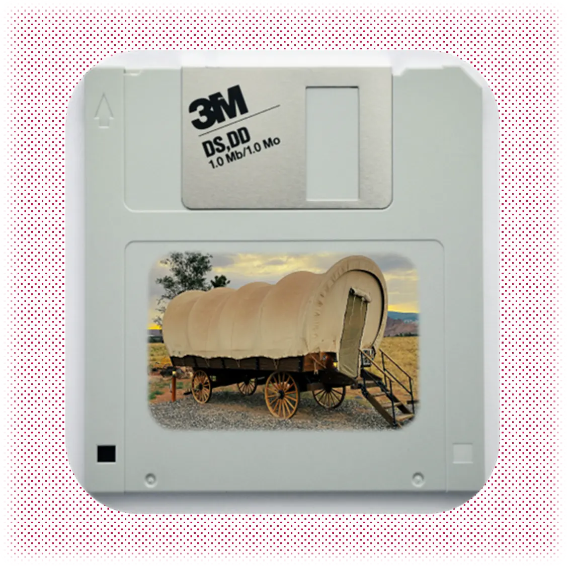 Closeup photo of a 1990s floppy disk for a game with a covered wagon on it.