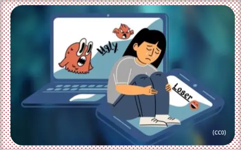 A cartoon girl sits in front of a laptop with two monsters and the word “ugly.