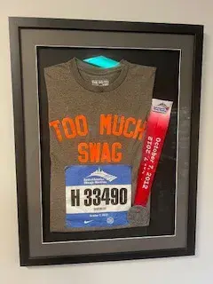 Araco Jr.’s shirt, bib and metal from running the Chicago Marathon.