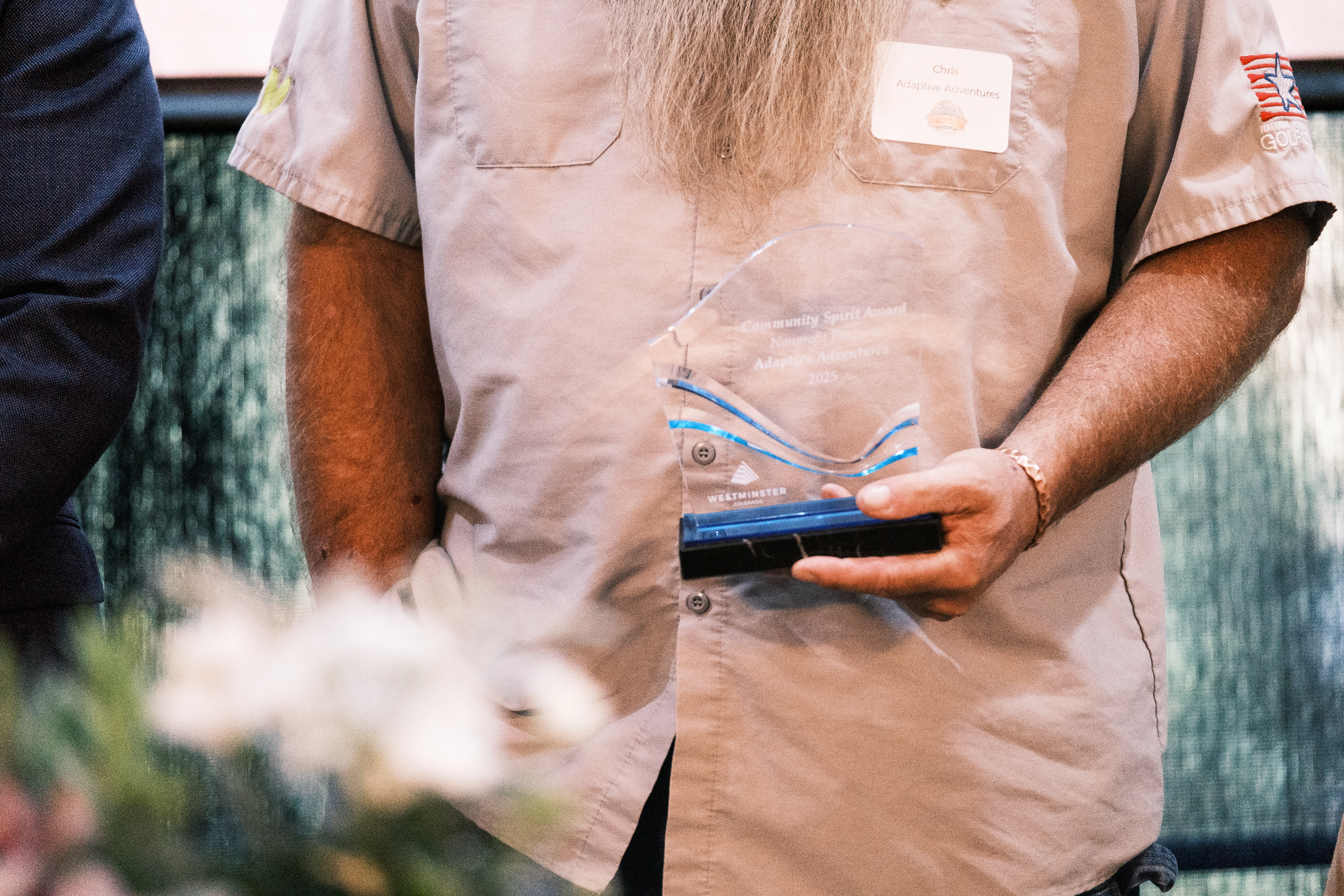 Close up of award being held in someone's hands