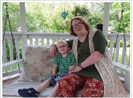 debra-bryant-and-son-on-a-swing.jpg