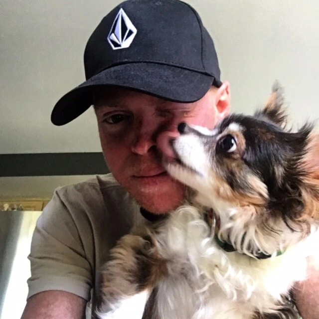 Aaran shares, "He’s 10 years old. A long hair chihuahua. He’s the most loving calm dog and keeps me company daily."